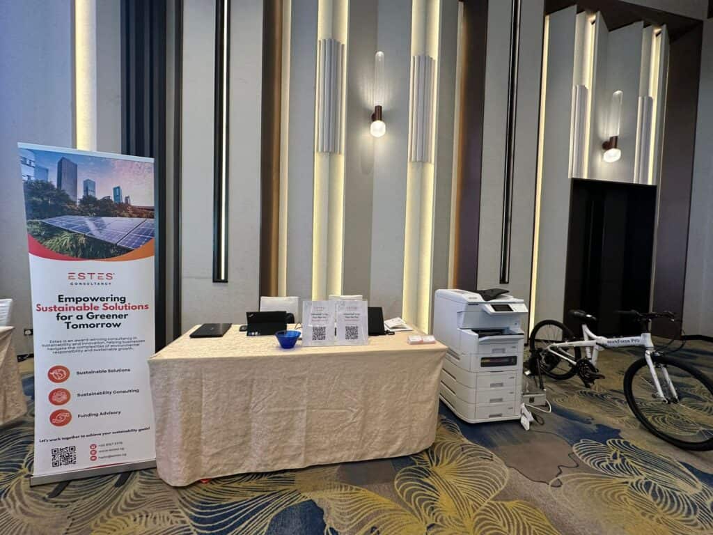 Estes Consultancy team showcasing ESG reporting solutions at Singapore Environmental Achievement Awards 2025 booth